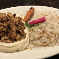 Lunch Hummus And Shawarma · Served with choice of fries or rice, soup or house salad, bread basket and dip.