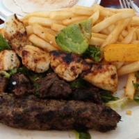 Lunch Shish Kafta · Two skewers of charbroiled ground beef and lamb, mixed with parsley, onions and spices. Serv...