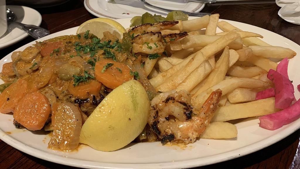 Salmon And Shrimp · Broiled salmon fillet, topped with shrimp and special sauce with assorted vegetables and house seasoning. Served with choice of fries or rice, soup or house salad, bread basket, and dip.