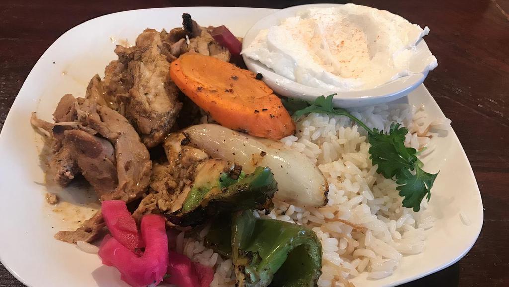 Chicken Shawarma · Marinated and broiled slices of quality chicken served garlic sauce. Served with choice of fries or rice, soup or house salad, bread basket, and dip.