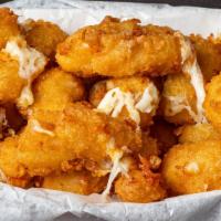 Cheese Curds  Bites · Bite size Wisconsin breaded cheese bites deep fried
