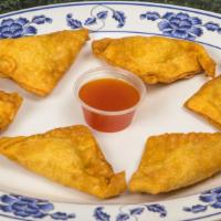 Crab Rangoon · Six pieces.