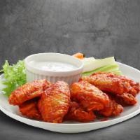 Holy Wings (7 Pcs) · Bone-in traditional chicken wings in your choice of wing sauce. Served with celery sticks an...