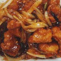 Yum Yum Chicken · Hot. Chicken with white and green onions in sweet and sour brown sauce.