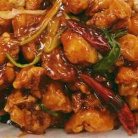 Orange Chicken · Hot. Chicken with green onions and broccoli in spicy orange flavored sauce.