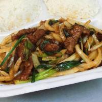 Mongolian Beef · Beef with white and green onions stir-fry with soy sauce and sugar.