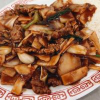 Ming’S Beef · Beef with bamboo shoots, water chestnut, and white and green onions in brown sauce.