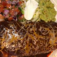 Enchiladas Verdes · Three tortillas rolled and filled with beef or chicken covered with green sauce.