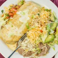 Chimichanga De Carne · A deep fried, golden & crispy flour tortilla filled with beef. Served with rice, beans and s...