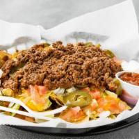 Nachos Supreme · Choice of protein, lettuce, tomatoes, sour cream, raw onions, jalapenos, cheese, and salsa o...