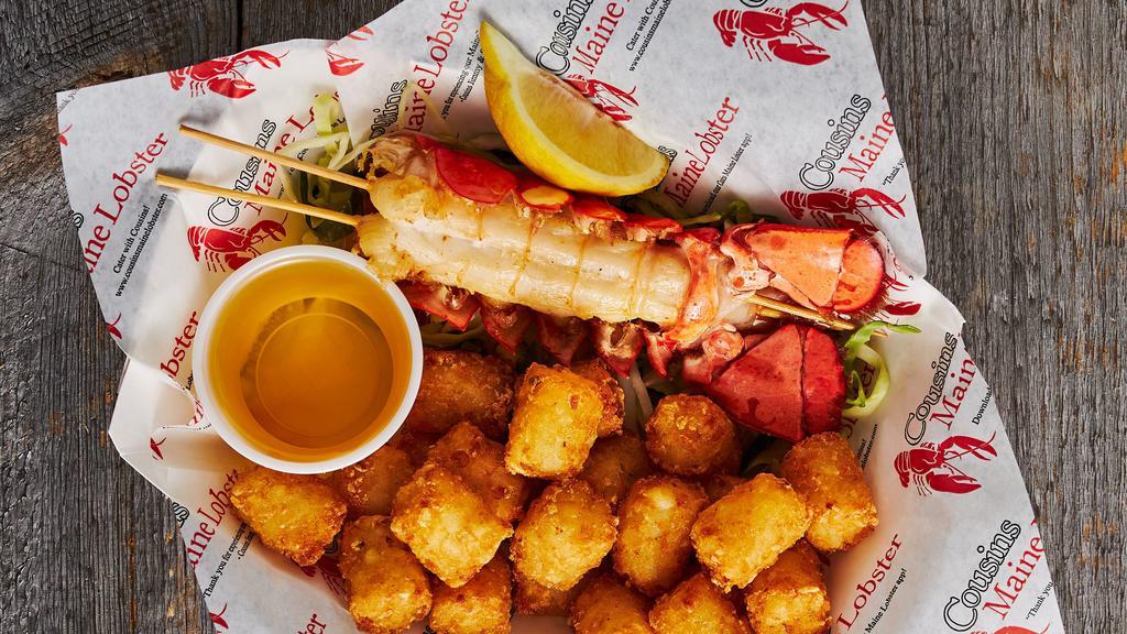 Lobster Tail & Tots · Maine's ultimate luxury. 4–5 oz. lobster tail in shell, served with drawn butter on the side with tater tots.