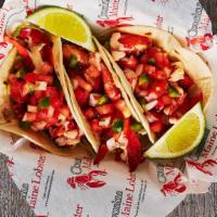 Lobster Tacos (3) · Maine lobster, served with cabbage, pico de gallo, and cilantro lime sauce, on flour tortill...
