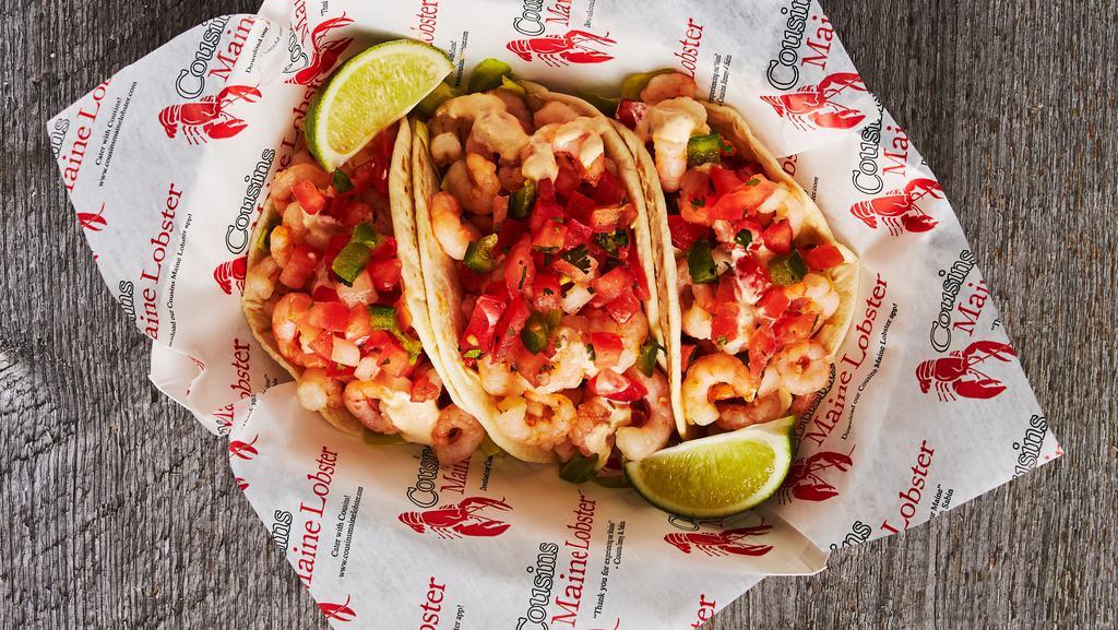 Shrimp Tacos (3) · North Atlantic Shrimp, served with cabbage, pico de gallo, and cilantro lime sauce, on flour tortillas. GF
