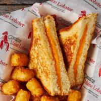 Grilled Cheese · Served with tots.