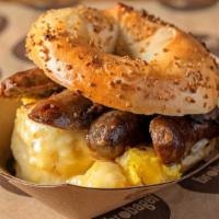 Atomic Bagel Sandwich · Hot Doug's famous spicy breakfast sausage, scrambled eggs, and melted pepper jack cheese! Ch...