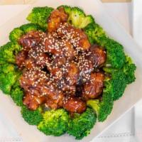 Chicken With Broccoli · Gluten-free. Sliced chicken breasts stir-fried in a lightly white garlic sauce with broccoli...