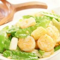 Shrimp Kow · Gluten-free. Shrimp stir-fried in a light white garlic sauce mixed with vegetables as brocco...