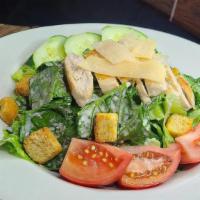 Asiago Chicken Caesar Salad · Romaine lettuce, croutons, asiago cheese in our special caesar dressing, topped with broiled...