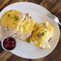 Roast Turkey · Slow roasted breast of turkey served with sage stuffing, mashed potatoes, cranberry sauce an...