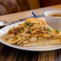 Cheese Quesadilla · Melted pepper jack cheese, caramelized onions, peppers and cilantro served with rice, beans,...