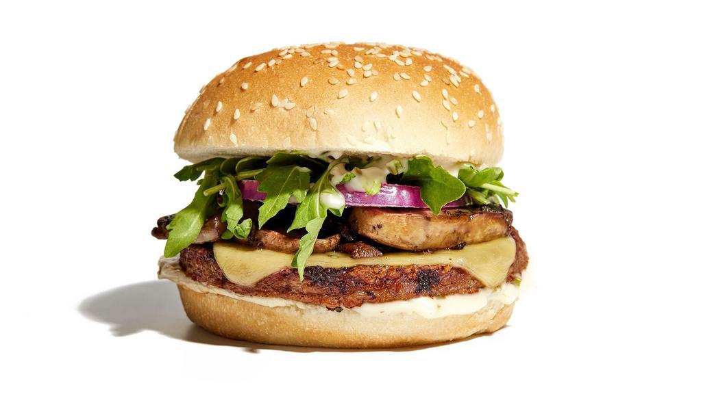 'Shroom Burger · Smoked gouda, mushrooms, arugula, red onion, roasted garlic mayo.