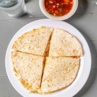 Quesadilla · Two flour tortillas, stuffed with Chihuahua cheese, your choice of meat, then grilled to per...