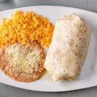 Burrito Dinner · Large flour tortilla filled with refried beans, lettuce, tomatoes and choice of meat.
