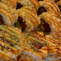 Spicy Tuna Roll (10Pc) · Seasoned tuna, cucumber, avocado, topping with crushed wasabi peas and fried onions, combo s...