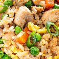 Chicken Fried Rice · Wok fried rice with chicken, eggs and veggies.