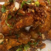 Vietnamese Nuoc Mam (Full Order) · 12 chicken wings. Vietnamese style wings, semi sweet, savory and hit of pepper flakes.