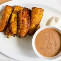 Deep Fried Plantains · Served with refried beans and sour cream.