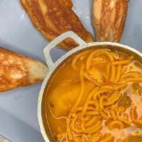 Sopa De Pollo · Chicken vegetables and noodle soup; served with toasted bread