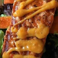 Ensalada De Salmon · Fresh cut Atlantc salmon, mixed greens, carrots and mango dressing.