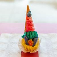 Ice Cream Clown. Super Fun!! · A scoop of vanilla ice cream on a sugar cone, transformed into eatable art piece.