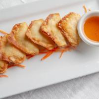 Crab Rangoon · Cream cheese with crab meat wrap in wonton wrap. Served with sweet sauce.