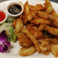 Vegetable Tempura · Deep fried battered mixed vegetables. Served with sweet chili sauce.