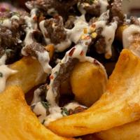 Truffle Fries  · sidewinder fries topped with aioli sauce