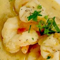 Rendezvous Pan Seard Shrimp  · Sauteed jumbo shrimp in garlic butter lemon sauce