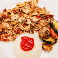 Chicken Shawarma · Thinly sliced white and dark meat marinated in a special blend of spices