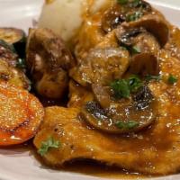 Chicken Marsala  · Chicken breast sauteed in a marsala wine sauce with mushrooms. Served with mashed potato and...