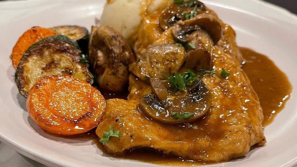 Chicken Marsala  · Chicken breast sauteed in a marsala wine sauce with mushrooms. Served with mashed potato and vegetables or garlic oil pasta