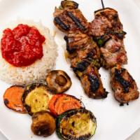 Beef Kabob  · Beef tenderloin, grilled served with rice and grilled vegetables