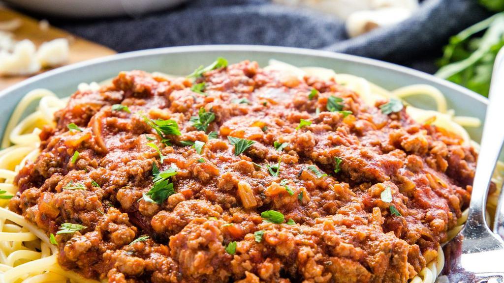 Pasta With Ground Beef Sauce · Spicy. Ground beef, celery, onion, garlic, tomato, jalapenos. Served with French bread or Injera.