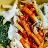 Feta Fries · curry dusted with garlic, herb, spicy green & red sauces