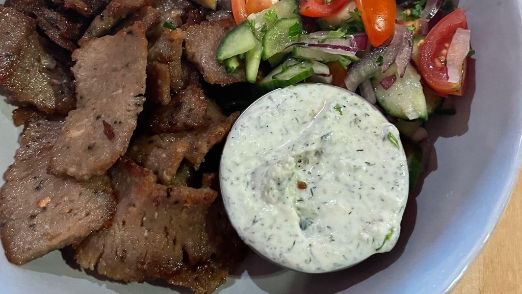 Gyro Bowl · Tasty Halal Gyro Meat, warm fresh pita triangles, hummos, tzatziki, Persia salad, beet pickles atop saffron rice.