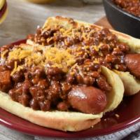 Chili Cheese Dog · Our delicious beef hot dog topped with our mouth-watering chili sauce and house cheese sauce.