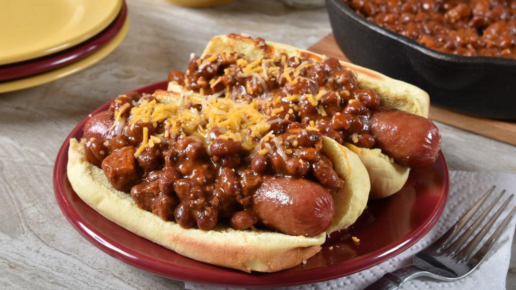Chili Cheese Dog · Our delicious beef hot dog topped with our mouth-watering chili sauce and house cheese sauce.