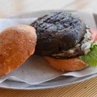 Porto Pure Burger · Creekstone Farms Premium Black Angus ground chuck and grilled portobello stacked together wi...