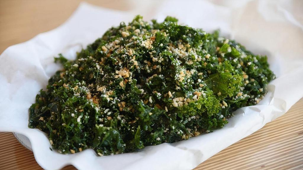 Hail The Kale · Fresh ribbons of kale lightly tossed with parmesan cheese and lemon olive oil dressing, topped with toasted panko bread crumbs. (618)