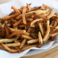 Truffle Fries · K fries tossed with truffle salt and parsley. (328)